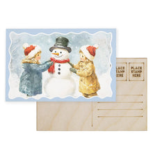 Load image into Gallery viewer, Sincere Surroundings - Building Snowman Scene - Wooden Postcards