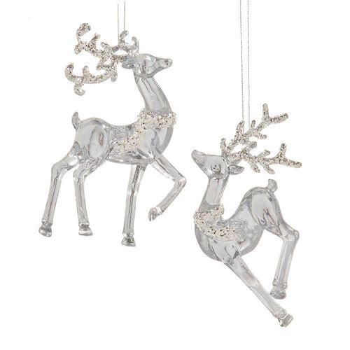 Decorative reindeer ornaments with crystal embellishments on a white background