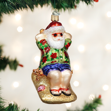Load image into Gallery viewer, Old World Christmas - Sunning Santa Ornament