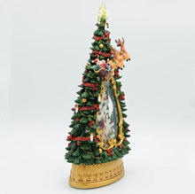 Load image into Gallery viewer, Swirl Tree with Village Santa