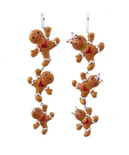 2 assorted gingerbread man ornaments on a white background
