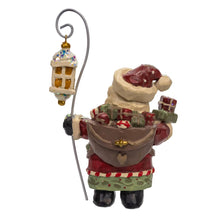 Load image into Gallery viewer, Kurt S. Adler, Inc. - 6.75" Snow Town Santa Holding Lamp Post Table Piece